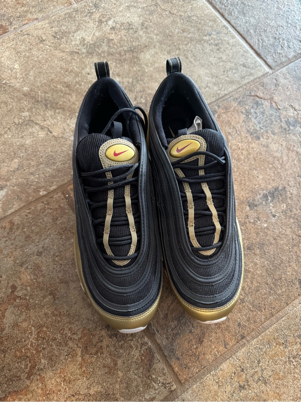 Nike Black Sneakers with Gold Accents